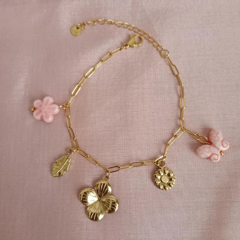 Butterfly Floral Charm Golden Chain Bracelet bracelet by Blingso