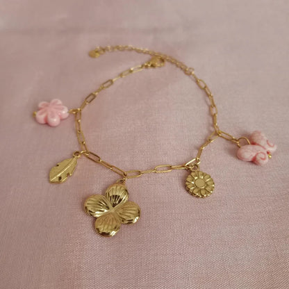 Butterfly Floral Charm Golden Chain Bracelet bracelet by Blingso