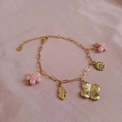 Butterfly Floral Charm Golden Chain Bracelet bracelet by Blingso