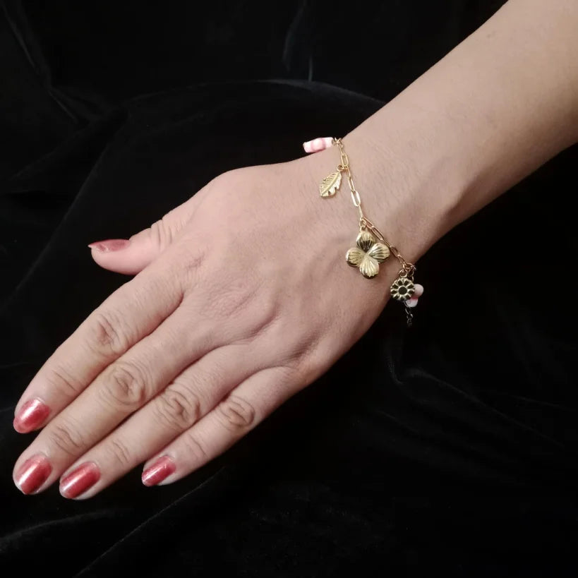 Butterfly Floral Charm Golden Chain Bracelet bracelet on Hands