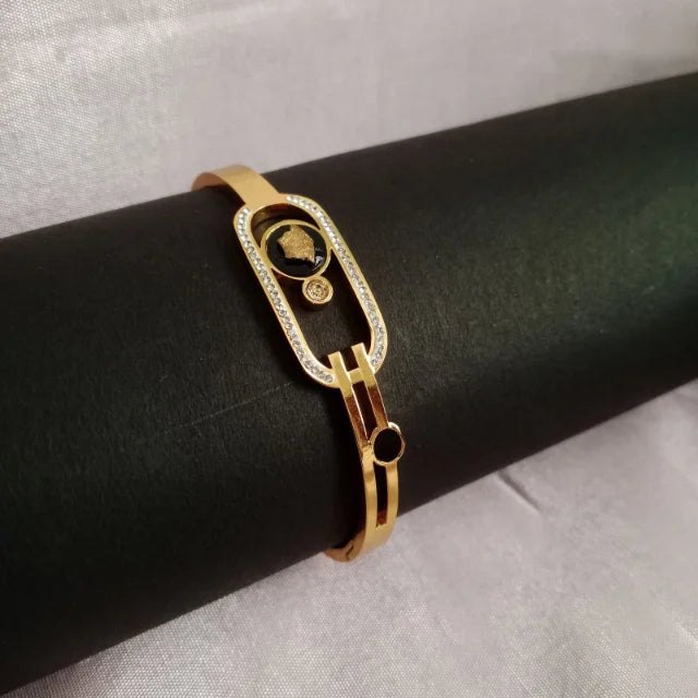 Blingso Elegant Black & Golden Bracelet – Main View 1