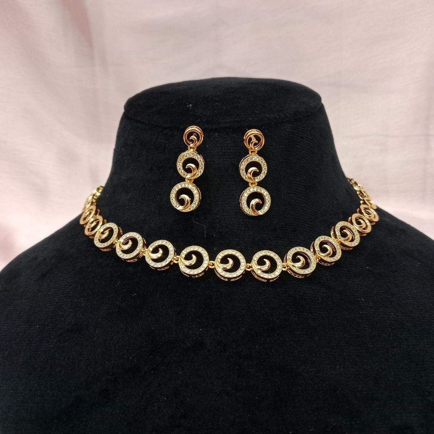 Blingso Golden Swirl Necklace & Earring Set – Main View