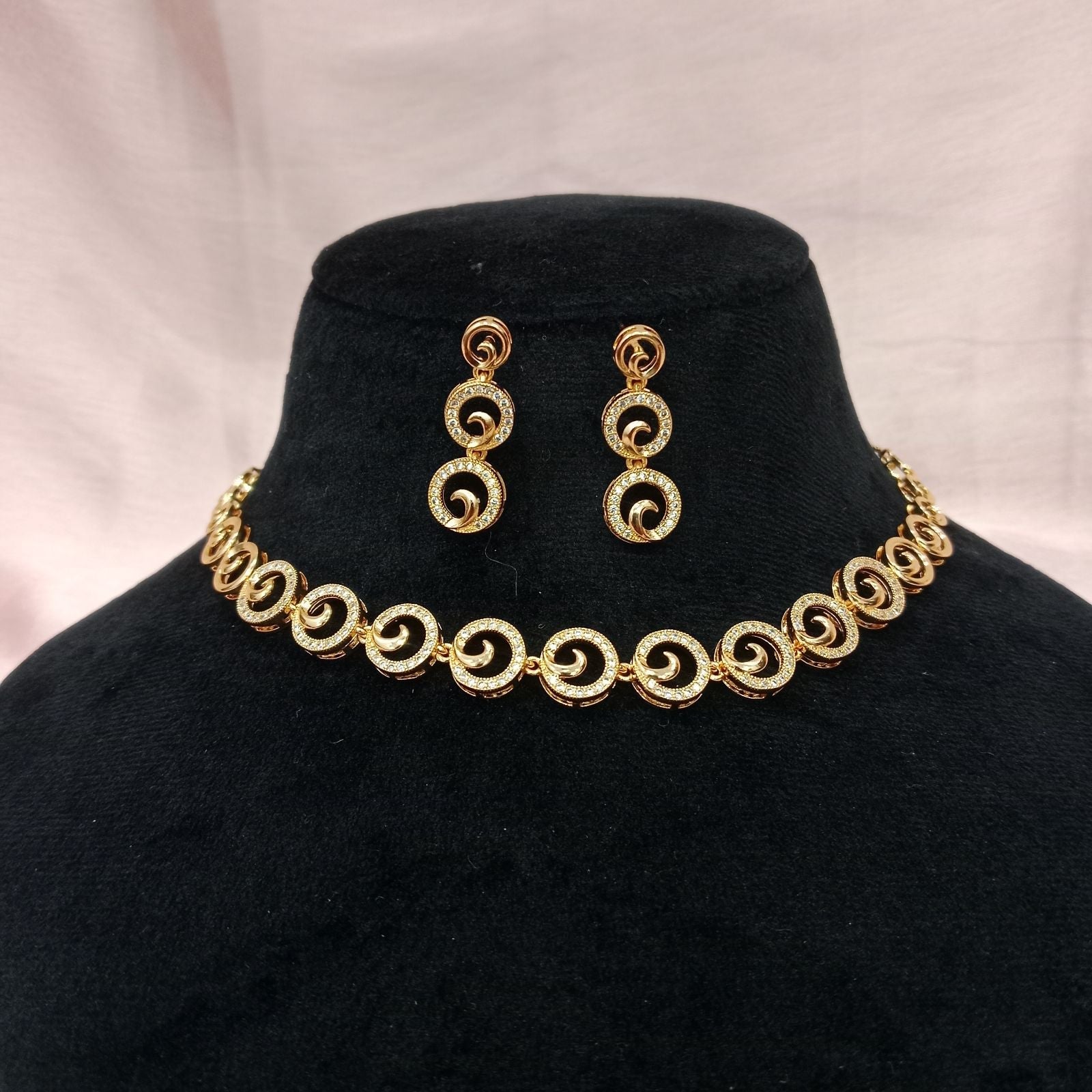 Blingso Golden Swirl Necklace & Earring Set – Main View