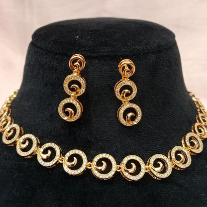 Blingso Golden Swirl Necklace & Earring Set – View 2