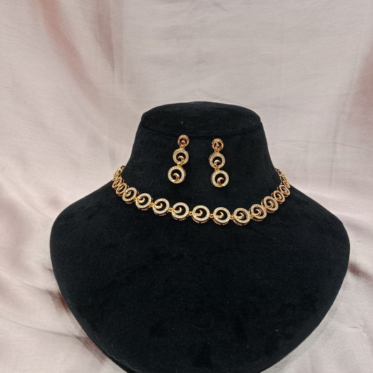 Blingso Golden Swirl Necklace & Earring Set – View 5