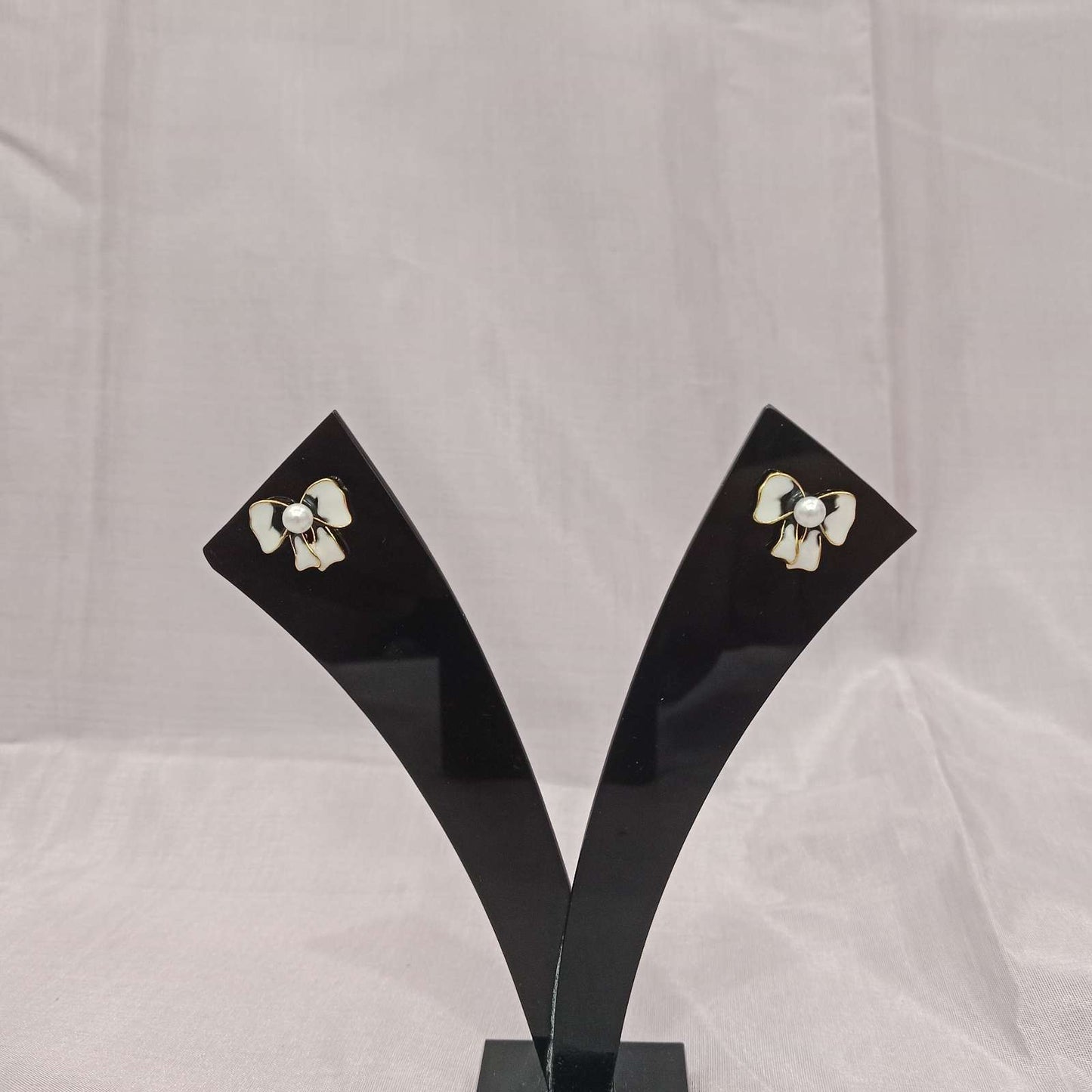 Pearl Bow Earrings – front view with pearl center