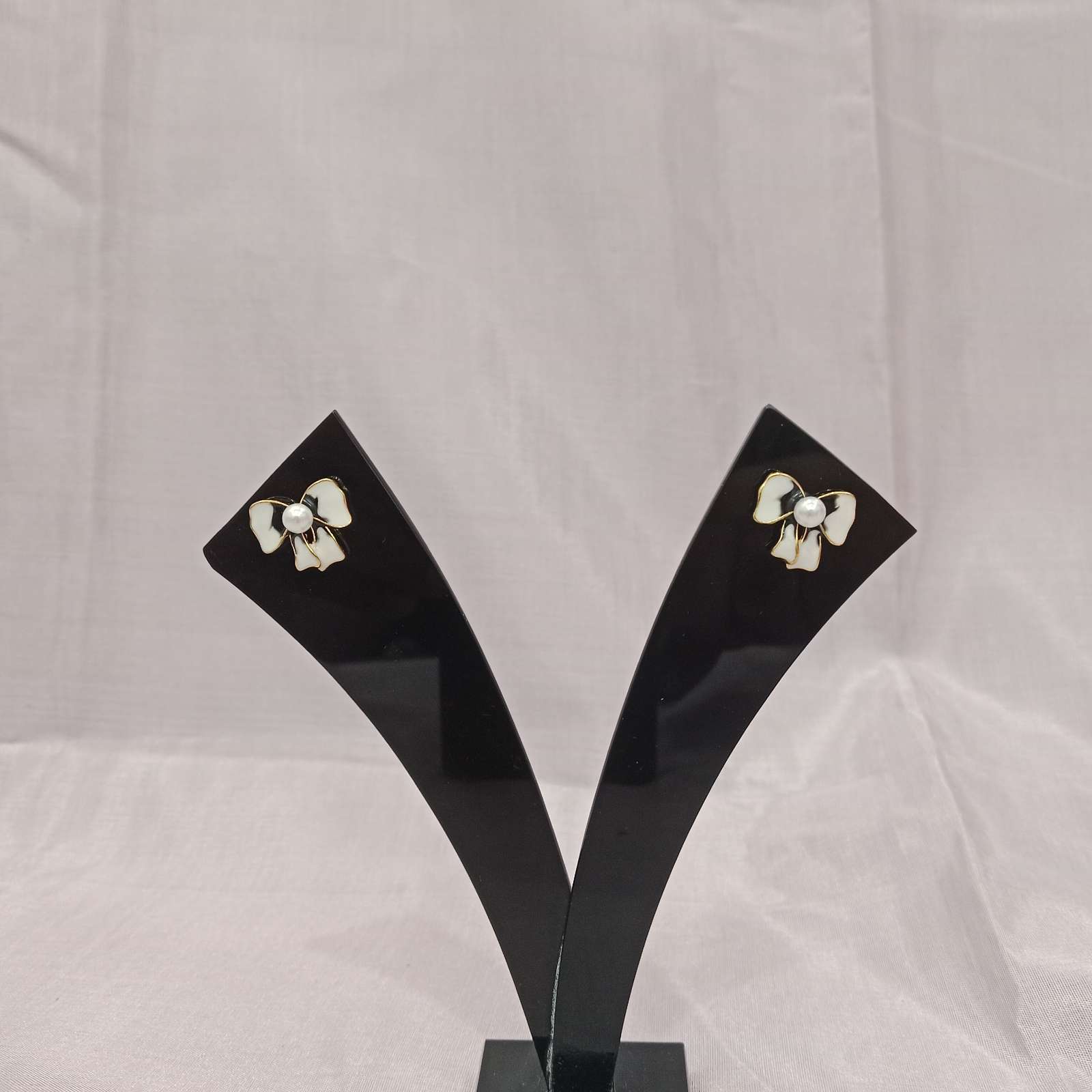 Pearl Bow Earrings – front view with pearl center