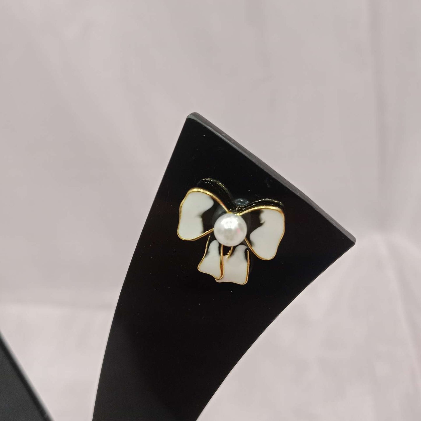 Pearl Bow Earrings – glossy enamel closeup