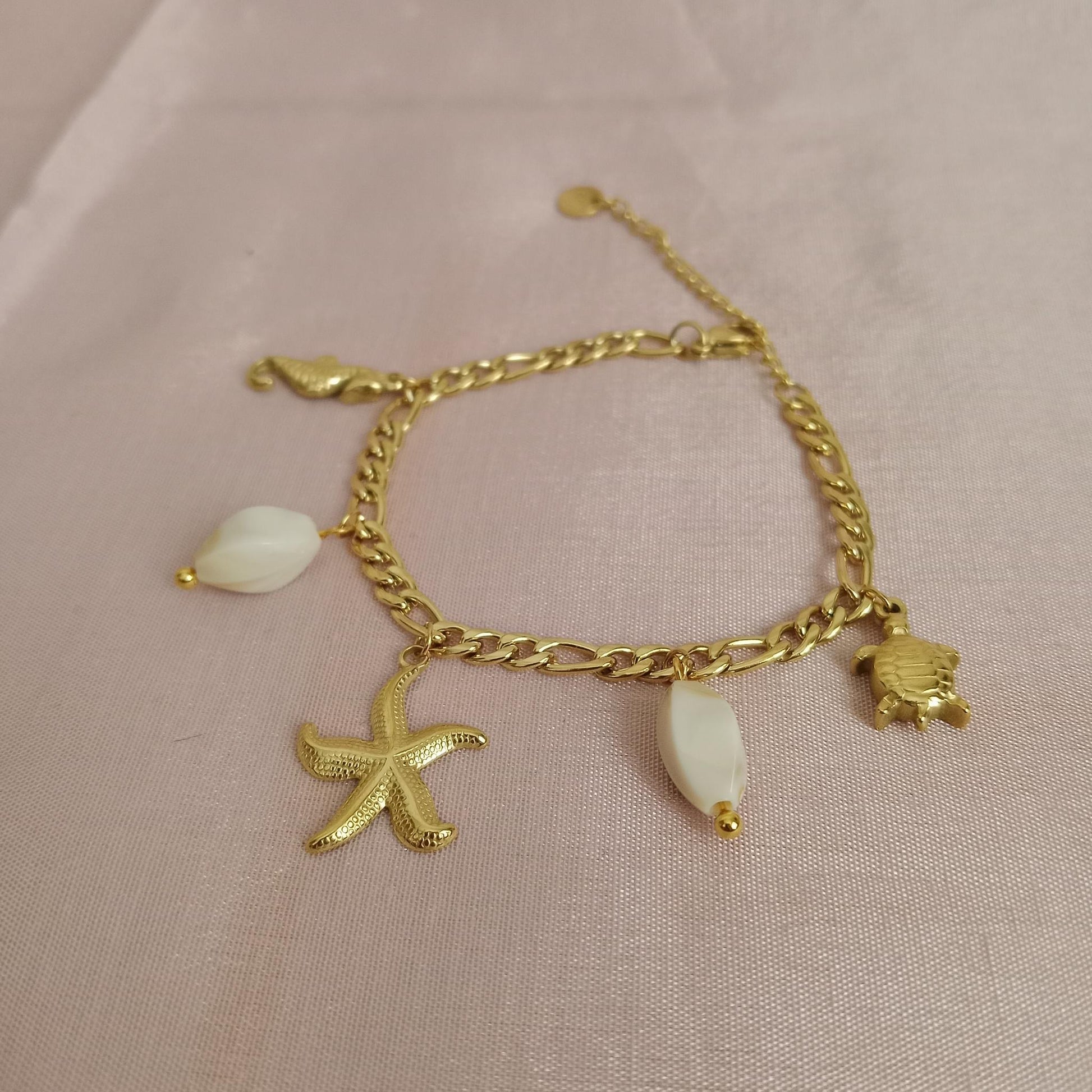 Seashell Charm Golden Chain Bracelet bracelet by Blingso