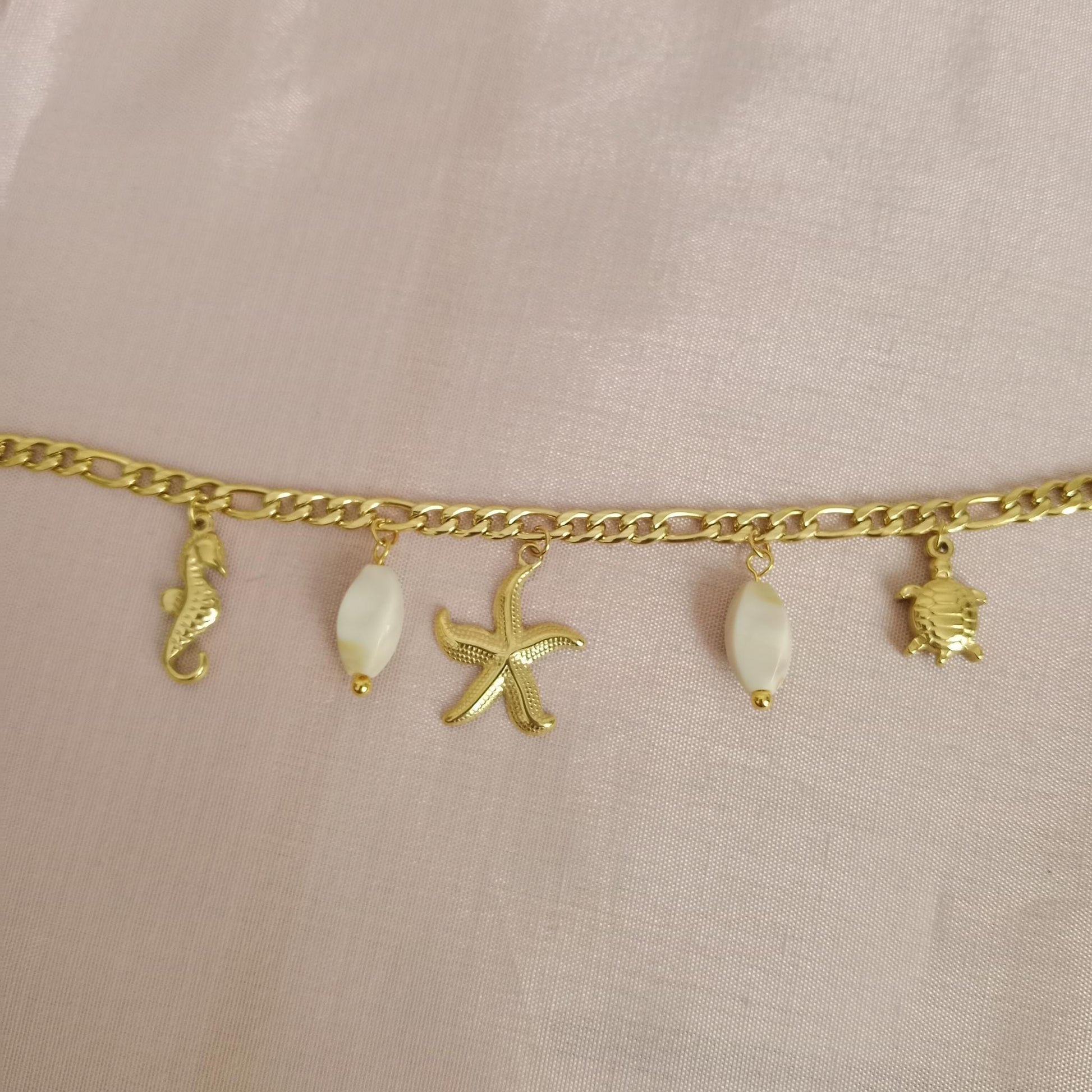 Seashell Charm Golden Chain Bracelet bracelet by Blingso