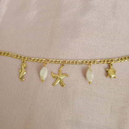 Seashell Charm Golden Chain Bracelet bracelet by Blingso