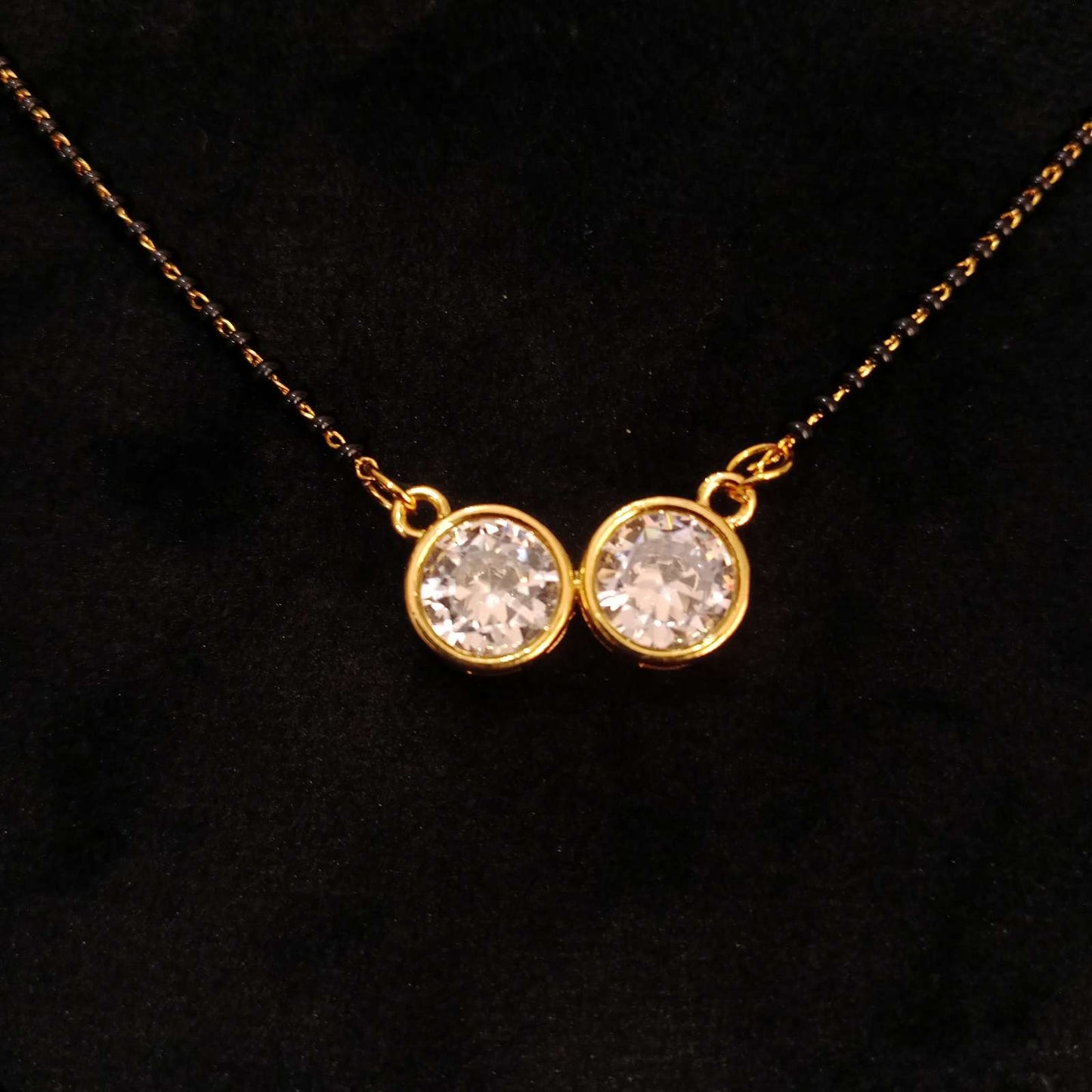 Solitaire Duo AD Mangalsutra Set – golden pendant and chain close view