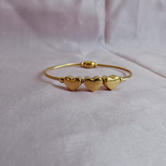 Three Heart Golden Bracelet bracelet by Blingso