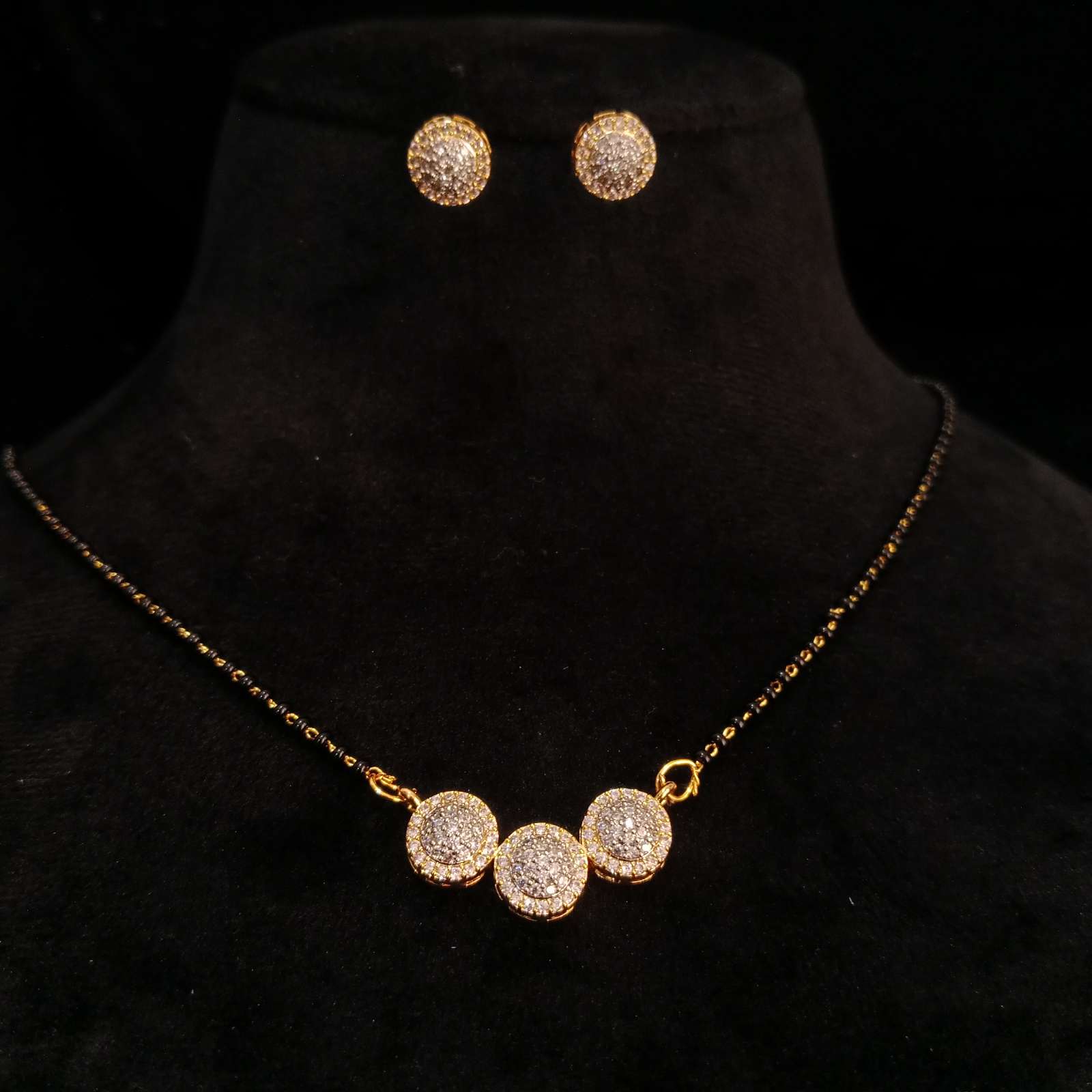 Trinity Glow AD Mangalsutra Set – elegant golden finish closeup