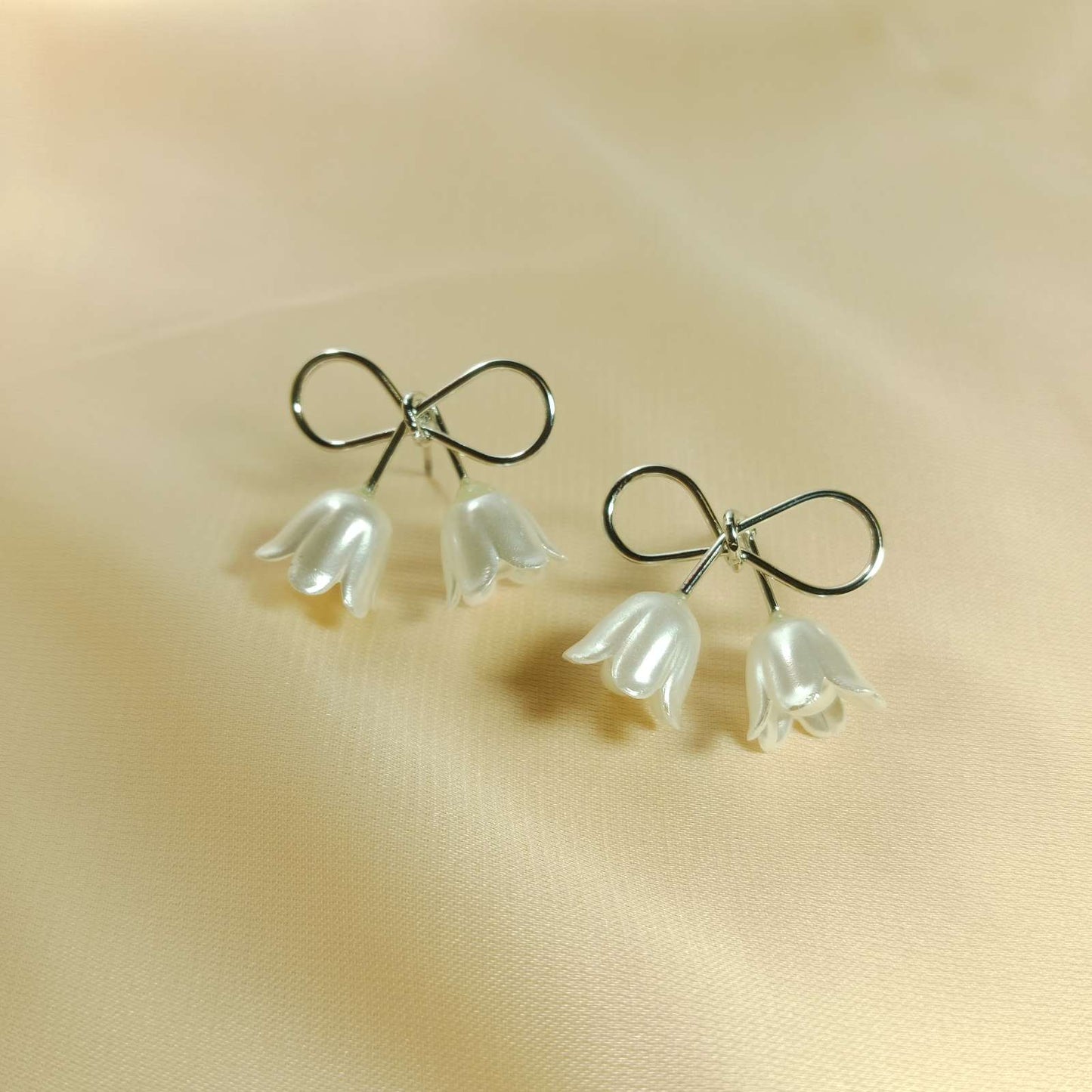 White Floral Bloom Earrings – elegant petal detailing closeup