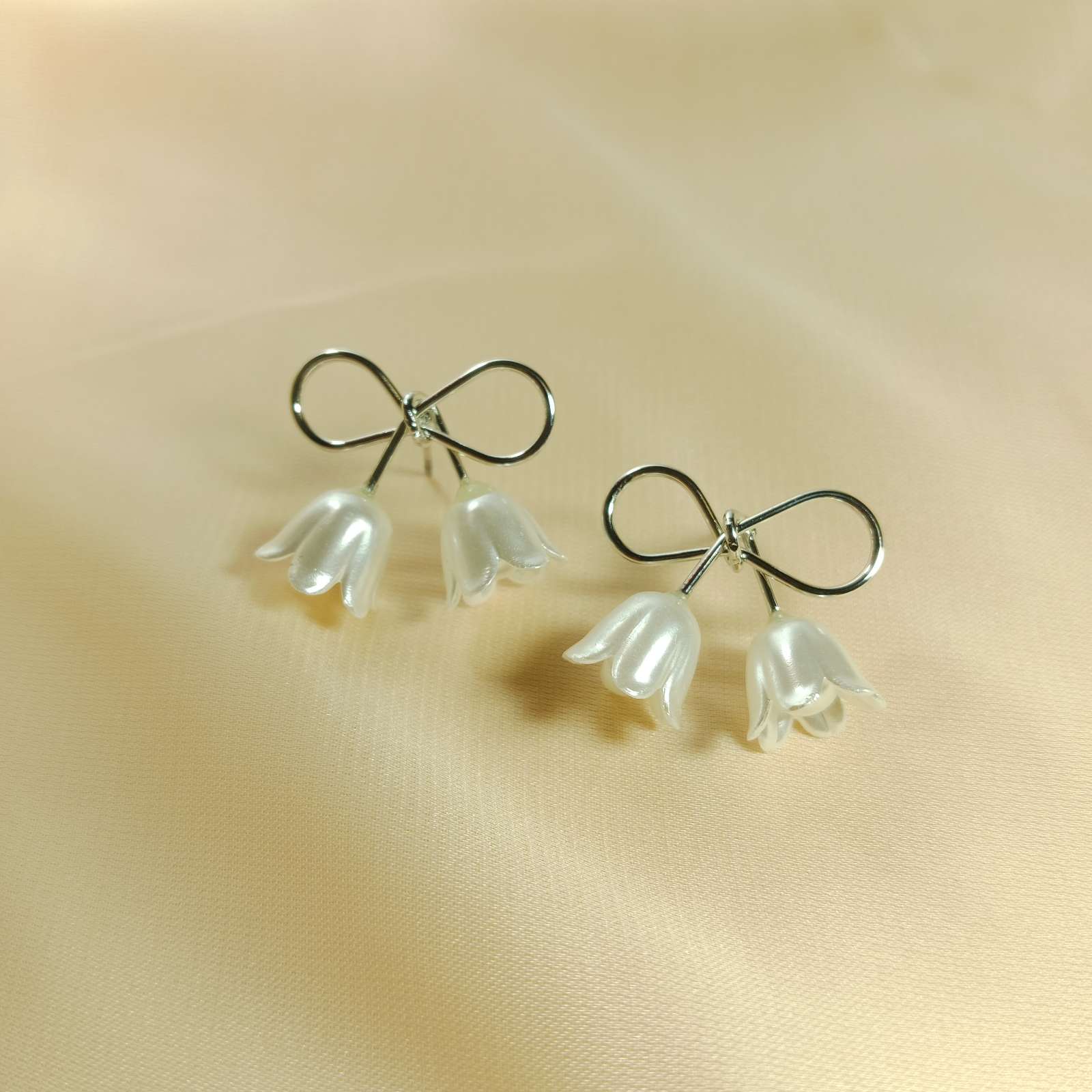 White Floral Bloom Earrings – elegant petal detailing closeup