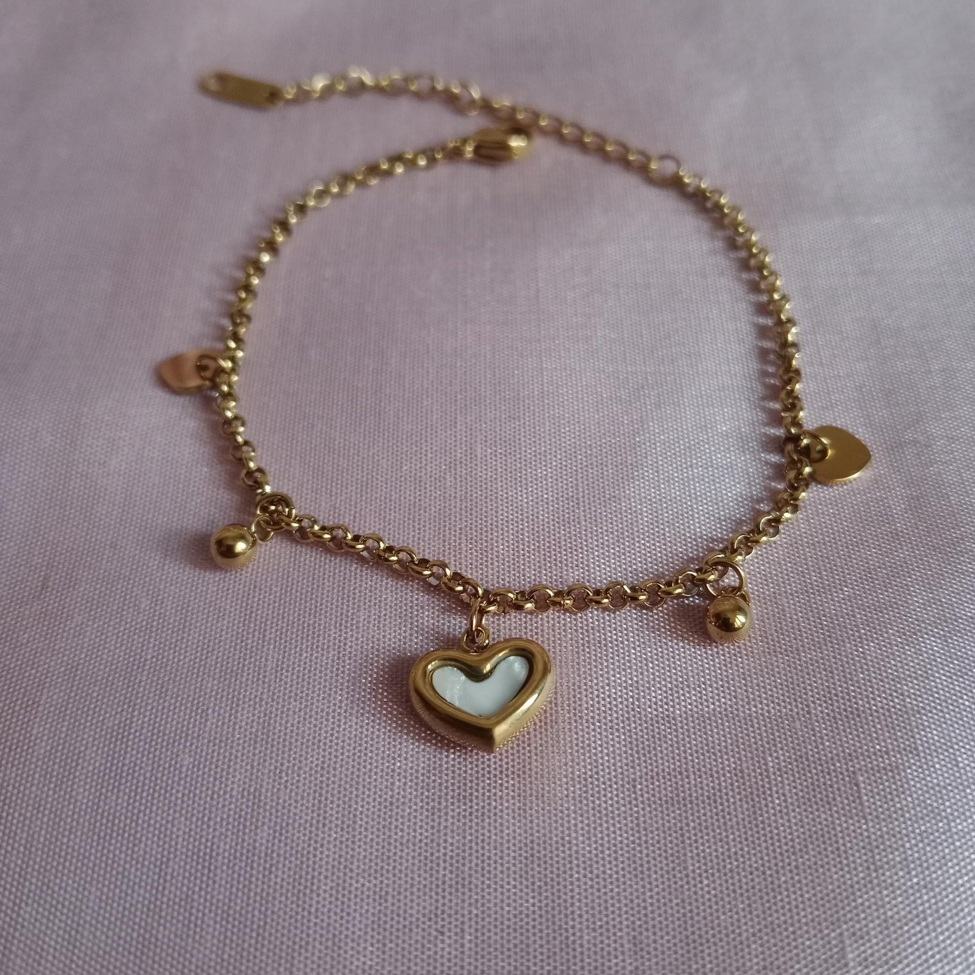 White Heart Charm Golden Chain Bracelet bracelet by Blingso