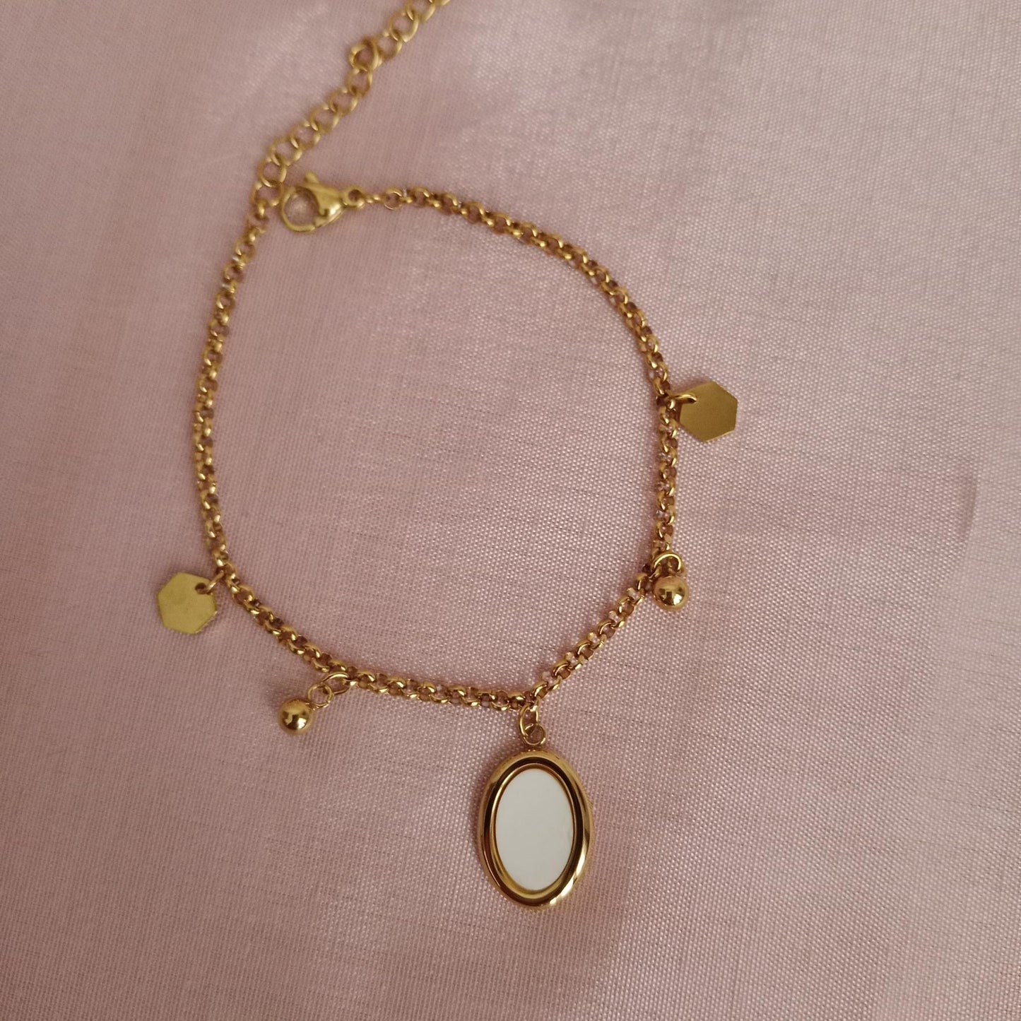 White Oval Charm Golden Chain Bracelet bracelet by Blingso