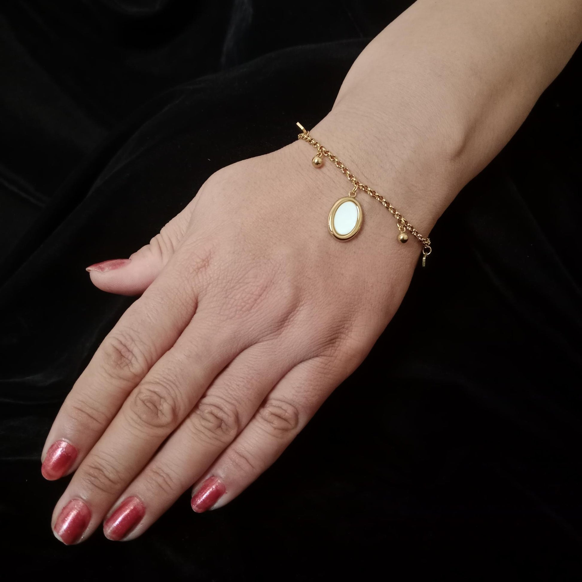 White Oval Charm Golden Chain Bracelet bracelet by Blingso